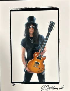 SLASH This By Robert M Knight: Guns N' Roses guitarist SLASH shows off one of his favorite guitars for renowned Rock photographer Robert M. Knight . Glossy 14x11 print.