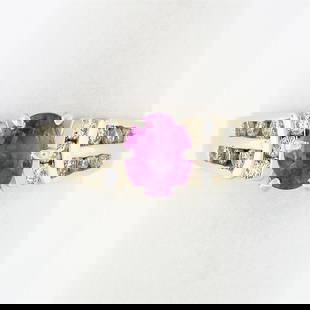14k TT Gold 1.18 ctw Pink Sapphire Solitaire Round Diamond Channel Engagement Ri: A solid 14k yellow & white gold engagement ring, with 1 oval cut natural pink sapphire (0.83ct ), and 18 round brilliant cut natural diamonds (F/G - VS1/VS2 ; 0.35ctw). The ring is size 6.5, weighs a
