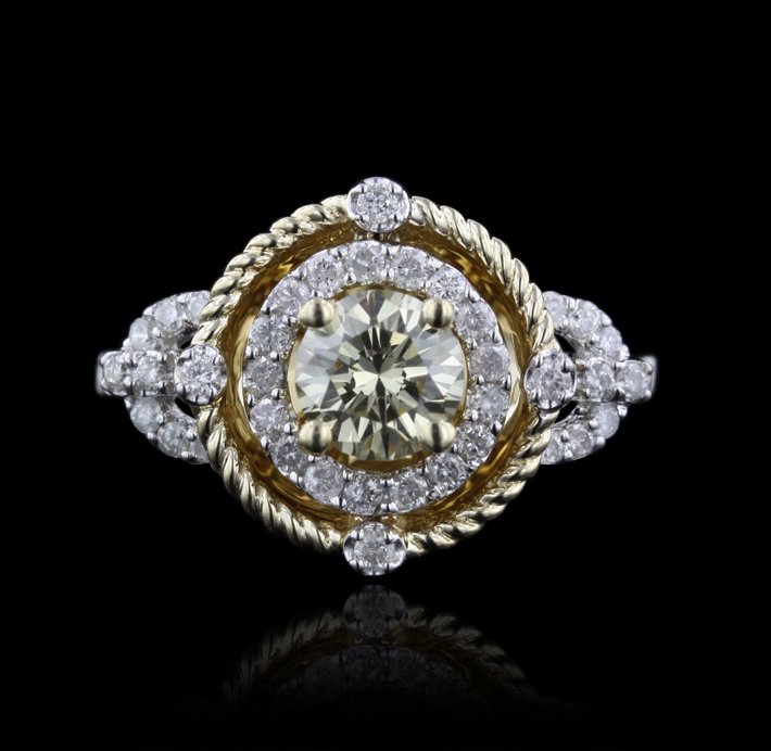14KT White Gold 0.77ct VS1 Yellow Diamond Ring A4407: 14KT White Gold 0.77ct VS1 Yellow Diamond Ring A4407. Good Condition! PT4621TC. One electronically tested 14KT white gold ladies cast & assembled diamond ring with a bright polish finish. Condition is