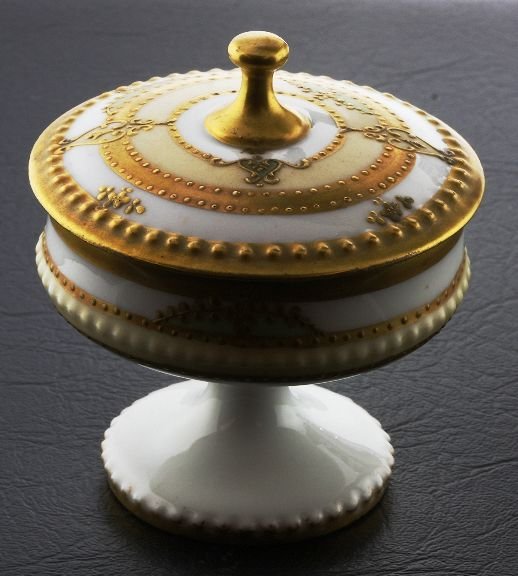 B & H Limoges France Art Deco Footed Dresser Jar ED76: B & H Limoges France Art Deco Footed Dresser Jar ED76 - Excellent Vintage Condition! TM11RD. No chips or cracks! Small footed dresser jar made by Limoges has lots of beadwork and gold trim on both the