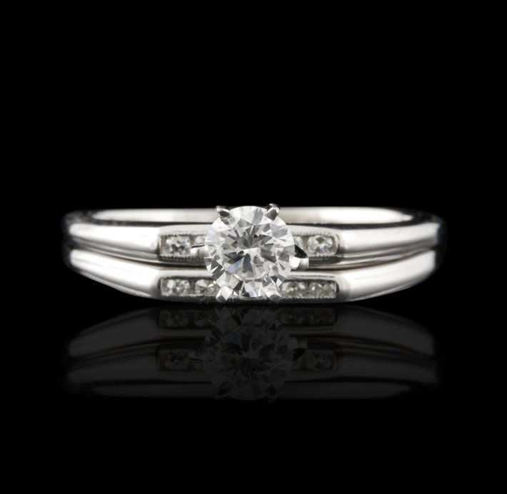 14KT White Gold 0.50ctw Diamond Wedding Ring Set GB1234: 14KT White Gold 0.50ctw Diamond Wedding Ring Set GB1234. Great Condition! MF956HC. One ring set featuring: 4.0 grams of 14KT white gold and dimonds with a total weight of 0.50ctw. Thank you for viewin