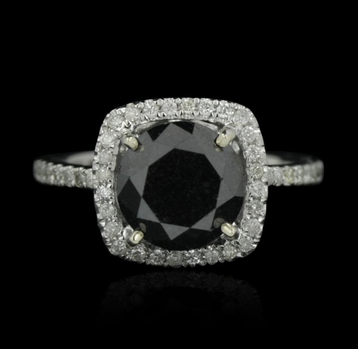 14KT White Gold 3.46ct Black & White Diamond Ring RM101: 14KT White Gold 3.46ct Black & White Diamond Ring RM1016. Great Condition! RY927RK. One electronically tested 14KT white gold ladies cast black and white diamond ring with a bright polish finish. Cond