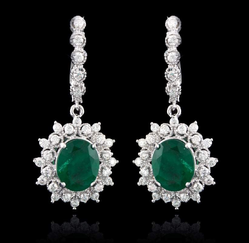 14KT White Gold 5.02ctw Emerald and Diamond Earrings AJ: 14KT White Gold 5.02ctw Emerald and Diamond Earrings AJF6. Good Condition! KG9622FX. One pair electronically tested 14KT white gold ladies cast and assembled memerald and diamond dangle style earrings