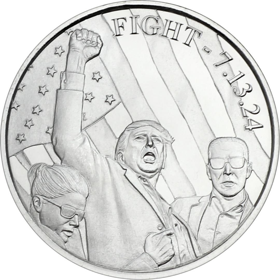 Donald Trump Fight 1oz .999 Fine Silver Coin: This Donald Trump Fight 1oz .999 Fine Silver Coin commemorates the iconic image from the assassination attempt, showing Trump defiantly raising his fist in a moment of resilience and strength. Minted 