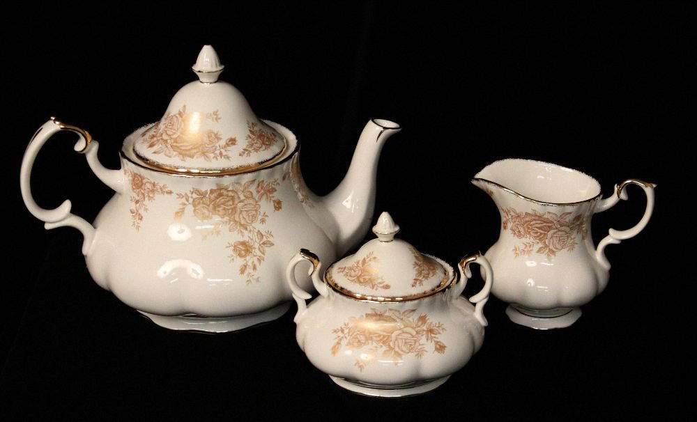 Royal Albert Roses Gold 3-pc. China Tea Set ED892: Royal Albert Roses Gold 3-pc. China Tea Set - TA13RF. Brand New & Unused Condition in original box with original packaging. Thank you for viewing this lot! We are always adding new inventory and new a