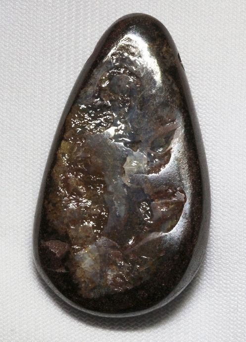 Boulder Opal (91.46ct.) BO69: Boulder Opal (91.46ct.) BO69. Excellent Condition! HP4NC. One Boulder Opal pendant weighing 91.46ctw. Thank you for viewing this lot! We are always adding new inventory and new auctions, so please che