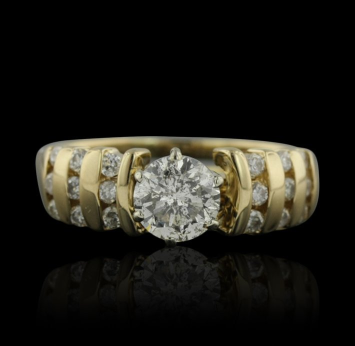14KT Yellow Gold 1.00ct I-1/I Diamond Ring GB1512: 14KT Yellow Gold 1.00ct I-1/I Diamond Ring GB1512. Good Condition! IT9421EZ. One electronically tested 14KT yellow gold ladies cast & assembled diamond wedding set. Condition is good. The wedding set 