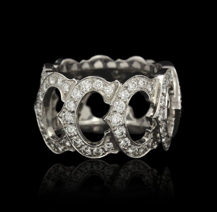 Cartier 18KT White Gold 2.00ctw Diamond Ring GB1157: Cartier 18KT White Gold 2.00ctw Diamond Ring GB1157. Great Condition! HL9015ED. One Cartier 18KT white gold 2.00ctw diamond ring. The ring features: linked Cartier "C" logos, 18KT white gold and (99)