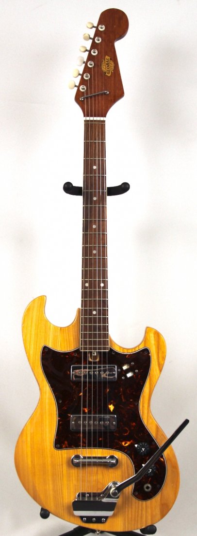 Global Vintage 70's Surf Electric Guitar DGUI95: Global Vintage 70's Surf Electric Guitar DGUI95. Good Condition! CD661QW. This is one cool 70's vintage surf guitar with tremolo. This 2 pickup ash body with rosewood fretboard guitar was on everyon's