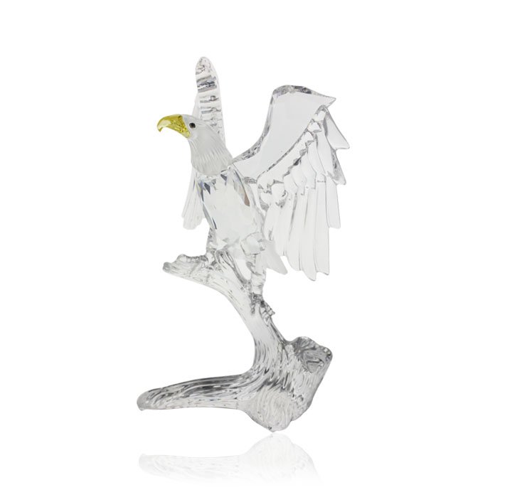 Swarovski Crystal "Bald Eagle" ED1523: Swarovski Crystal "Bald Eagle" ED1523. Excellent condition! IS902DC. One Swarovski Crystal Bald Eagle featuring: clear and frosted smooth crystal, light topaz beak, green crystal eyes, 5'' tall,certif
