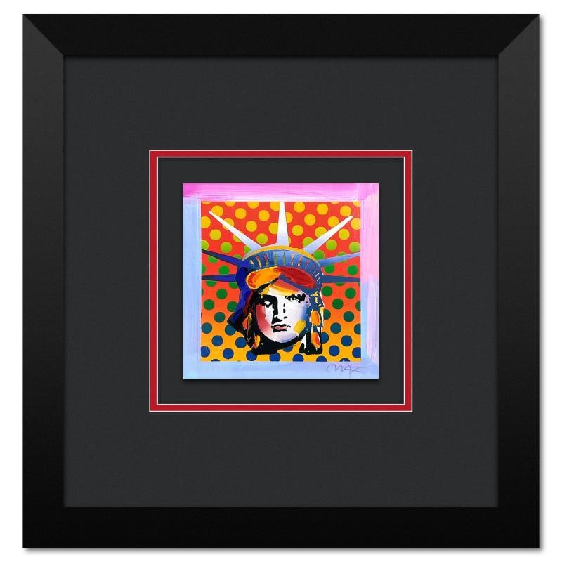 Liberty Head XI by Peter Max: "Liberty Head XI" is a limited edition lithograph on paper by Peter Max, numbered and hand signed by the artist. This piece comes framed. Includes Certificate of Authenticity from Peter Max Studios. M