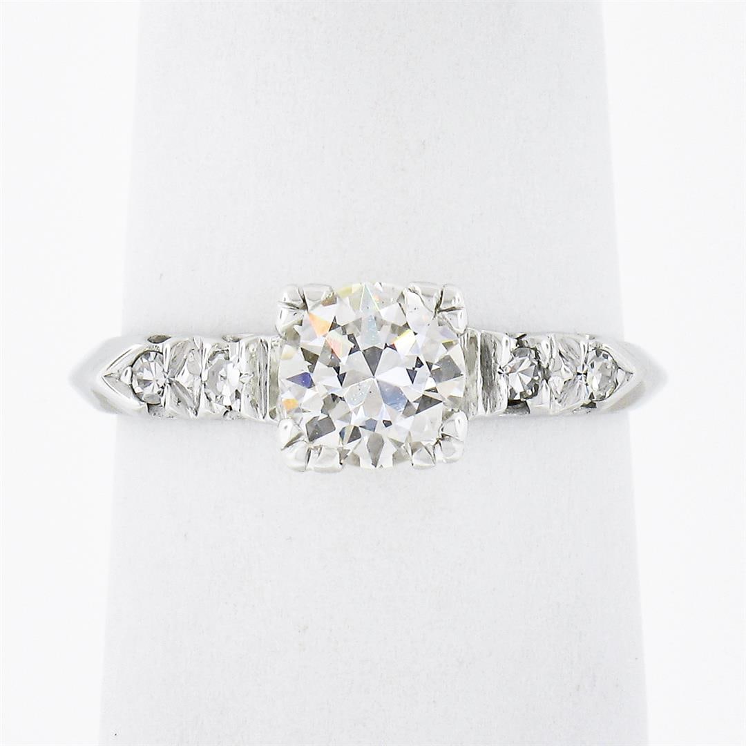 Vintage 14K White Gold.73 ctw Transitional Cut Diamond Engagement Ring w/ Accent: A vintage solid 14k white gold engagement ring, with 1 old transitional cut natural diamond (H - VS2 ; 0.65ct ), accented with 4 old single cut natural diamonds (G/H - VS1/VS2 ; 0.08ctw). The ring is 