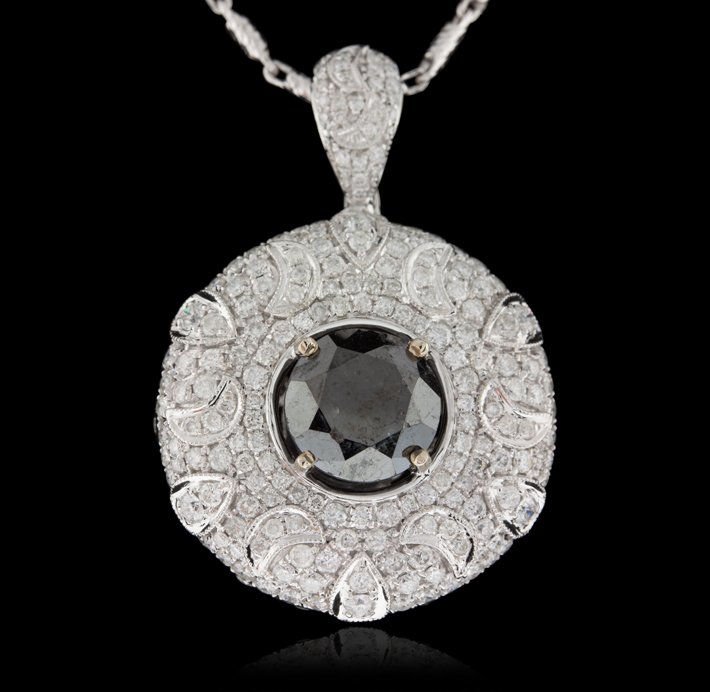 14KT White Gold 6.49ct Black and White Diamond Pendant : 14KT White Gold 6.49ct Black and White Diamond Pendant with Chain RM949. Great Condition! QD9063HQ. One electronically tested 14KT white gold ladies cast & assembled black and white diamond pendant/en