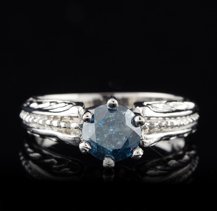 14KT White Gold 1.22ct Blue Diamond Ring FRD77: 14KT White Gold 1.22ct Blue Diamond Ring FRD77. Great Condition! XW626TH. One electronically tested 14KT white gold ladies cast and assembled diamond solitaire ring. Condition is new, good workmanship