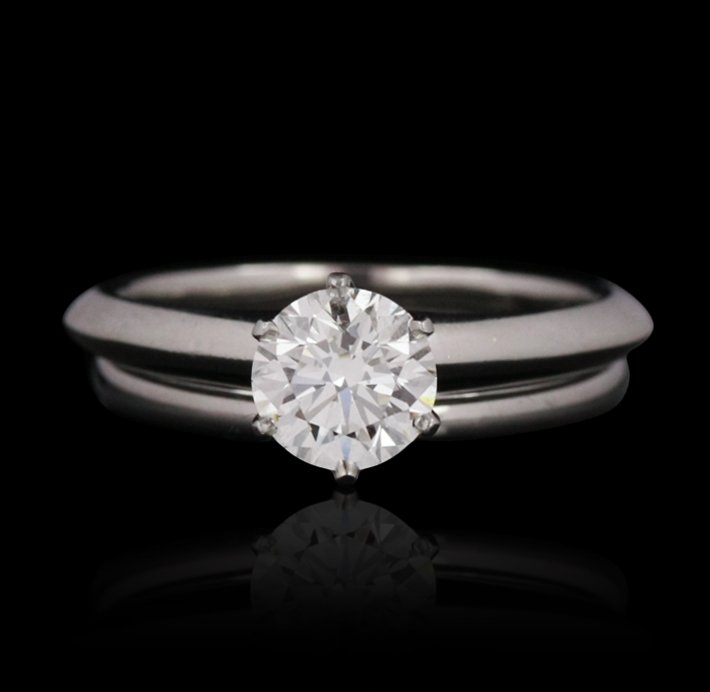 Tiffany & Co. Platinum 1.20ct VS-2/I Diamond Wedding Se: Tiffany & Co. Platinum 1.20ct VS-2/I Diamond Wedding Set GB1450.Good condition! YN9027QN. One electronically tested platinum ladies cast diamond solitaire wedding set with a bright polish finish. Cond