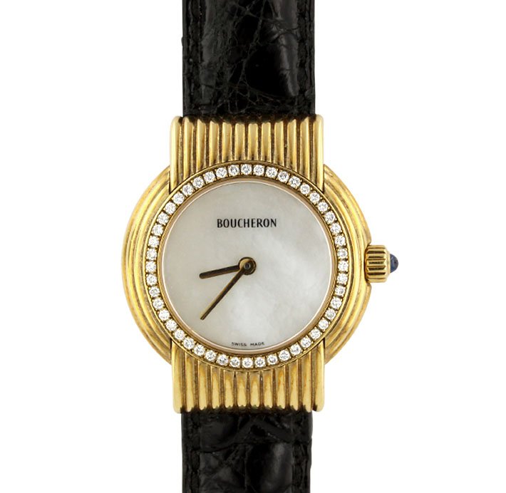 Boucheron 18KT Yellow Gold MOP and Diamond Wristwatch G: Boucheron 18KT Yellow Gold MOP and Diamond Wristwatch GB1150. Great Condition! ET9861ND. One ladies Boucheron 18KT yellow gold mother of pearl and diamond wristwatch. The watch features: 18KT yellow g