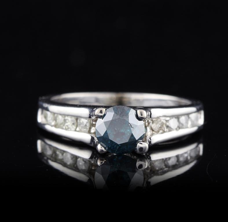 14KT White Gold 0.80ct Greenish Blue & White Diamond: 14KT White Gold 0.80ct Greenish Blue & White Diamond Ring FRD91. Great Condition! TQ355BY. One electronically tested 14KT white gold ladies cast diamond unity ring with a bright polish finish. Conditi