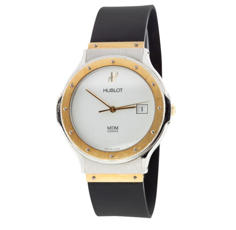 Hublot Geneve Mens MDM Wristwatch GB1594: Hublot Geneve Mens MDM Wristwatch GB1594. Good condition! UR4051GJ. One Hublot MDM Geneve Swiss wrist watch featuring a 18k gold and stainless steel case & clasp. The case is exquisitely crafted in s