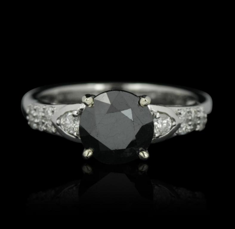 14KT White Gold 2.42ct Black & White Diamond Ring: 14KT White Gold 2.42ct Black & White Diamond Ring RM1026. Great Condition! DQ507GE. One lady's polished, stamped and electronically tested solid 14K white gold ring mounted with: I Genuine Round Black