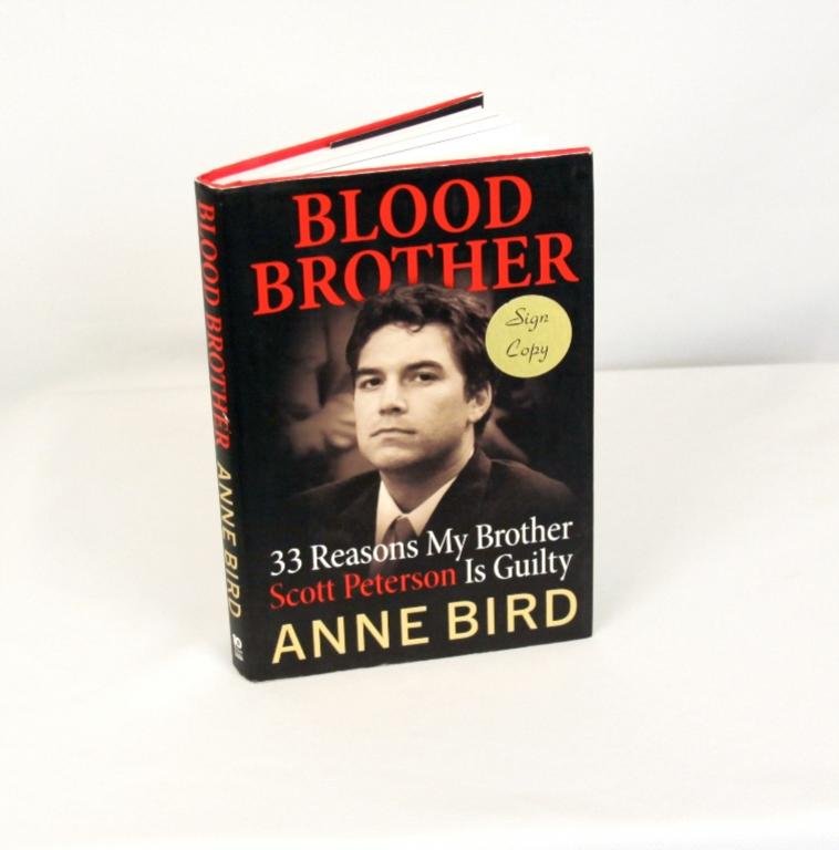 Signed Copy of Blood Brother by Anne Bird BK212: Signed Copy of Blood Brother by Anne Bird BK212. As-Is Condition! ZA63CL. This copy of 'Blood Brother: 33 Reasons Why My Brother Scott Peterson is Guitly' is signed by the author, Anne Bird.