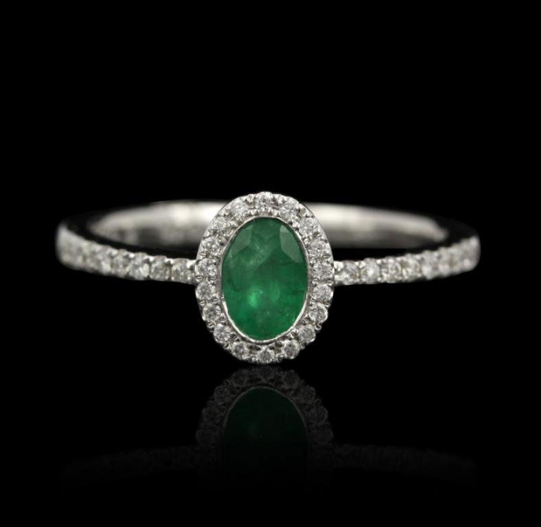 14KT White Gold 0.45ct Emerald and Diamond Ring FJM2266: 14KT White Gold 0.45ct Emerald and Diamond Ring FJM2266. Excellent Condition! LN653VS. One ring featuring: 2.35gm of 14KT white gold, (1) emerald with a total weight of 0.45cts and (34) round cut diam