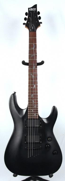 Schecter Damien FR in Flat Black DGUI36: Schecter Damien FR in Flat Black DGUI36. Great Condition! VG802LR. The Schecter Damien FR is a true rock electric guitar that features an arched basswood body, bolt-on rock maple neck, and a rosewood 
