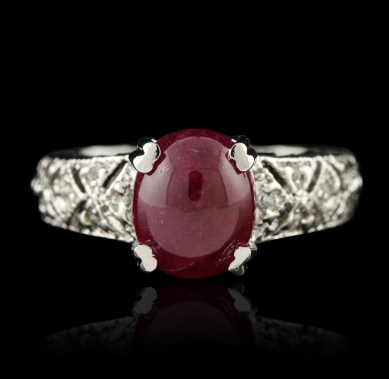 SILVER 4.45ct Ruby and White Sapphire Ring SLV231: SILVER 4.45ct Ruby and White Sapphire Ring SLV231. Good Condition! WQ25PM. One ring featuring: 4.0 grams of sterling silver, (1) ruby with an approximate total weight of 4.45ct and white sapphires.