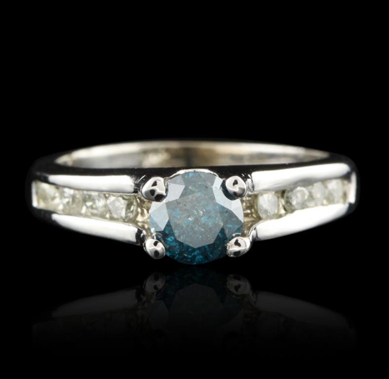 14KT White Gold 0.68ct Blue and White Diamond Ring FRD6: 14KT White Gold 0.68ct Blue and White Diamond Ring FRD6. Great Condition! BX807QU. One electronically tested 14KT white gold ladies cast diamond unity ring with a bright polish finish. Condition is ne