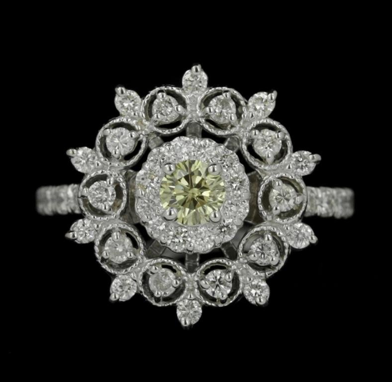 14KT White Gold 0.30ct Green & White Diamond Ring AJF50: 14KT White Gold 0.30ct Green & White Diamond Ring AJF50. Good Condition! CZ2011NE. One electronically tested 14KT white gold ladies cast diamond ring. Condition is good. The featured green diamond is 