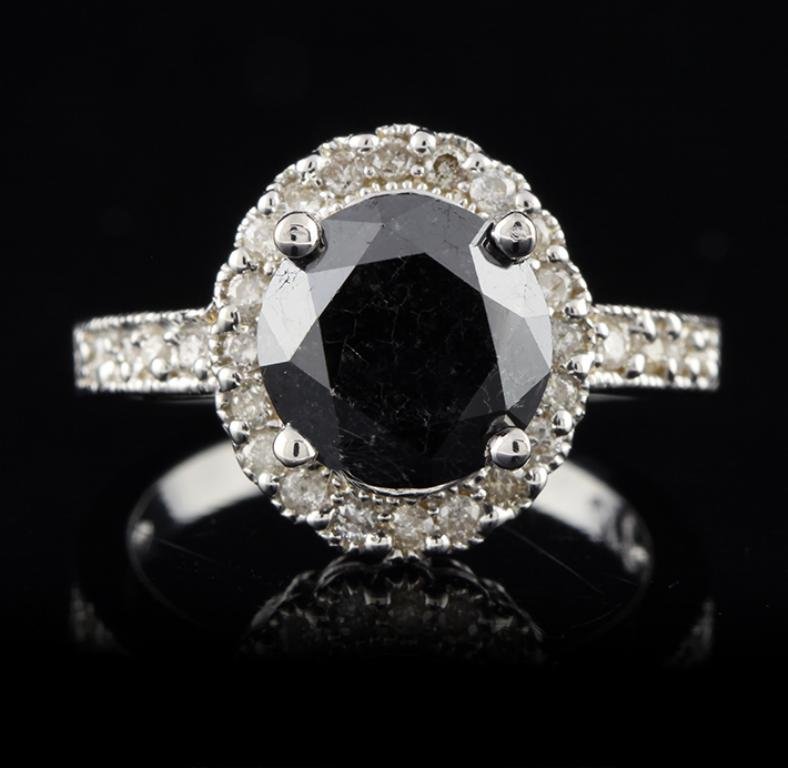 14KT White Gold 3.46ct Black & White Diamond Ring FRD61: 14KT White Gold 3.46ct Black & White Diamond Ring FRD61. Great Condition! UX6001HA. One electronically tested 14KT white gold ladies cast black and white diamond ring. Condition is new, good workmansh