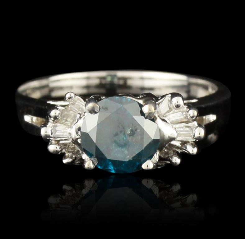 14KT White Gold 1.20ct Blue Diamond Ring FRD448: 14KT White Gold 1.20ct Blue Diamond Ring FRD448. Great Condition! XH2001BX. One polished, stamped, and electronically tested solid 14KT white gold ring featuring: 1 genuine round, brilliant cut diamon