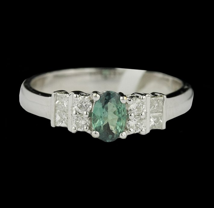 14KT White Gold 0.50ct Alexandrite and Diamond Ring: 14KT White Gold 0.50ct Alexandrite and Diamond Ring CRJ46. Good Condition! CY109XK. One ring featuring: 3.45 grams of 14KT white gold, (1) alexandrite with a total weight of 0.50ctw, (4) princess diam