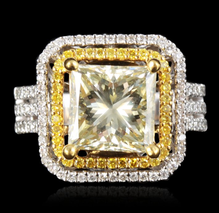 18KT White Gold 4.42ct SI-2/Light Yellow Diamond Ring: 18KT White Gold 4.42ct SI-2/Light Yellow Diamond Ring RM1139. Great Condition! UJ10002PL. One electronically tested 18KT white gold ladies cast diamond ring. Condition is new, good worksmanship. The f