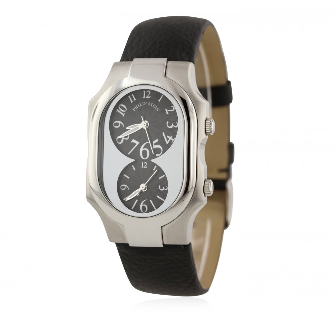 Phillip Stein Stainless Steel Dual Time Zone Watch: Phillip Stein Stainless Steel Dual Time Zone Watch. Good Condition. EL213RQ. One Phillip Stein auto dual time zone watch. The watch features: polished stainless steel case measuring 30mm, wavy black d