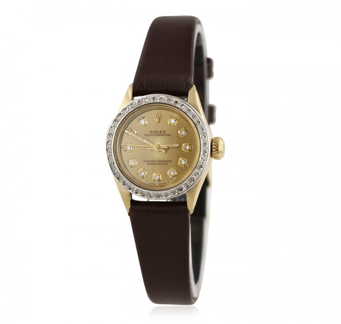 Ladies Rolex 18KT Yellow Gold Oyster Perpetual: Ladies Rolex 18KT Yellow Gold Oyster Perpetual Wristwatch BD399. Average Condition! RV1003XY. One ladies, hand crafted & machine milled Rolex Oyster Perpetual model wristwatch electronically tested 18