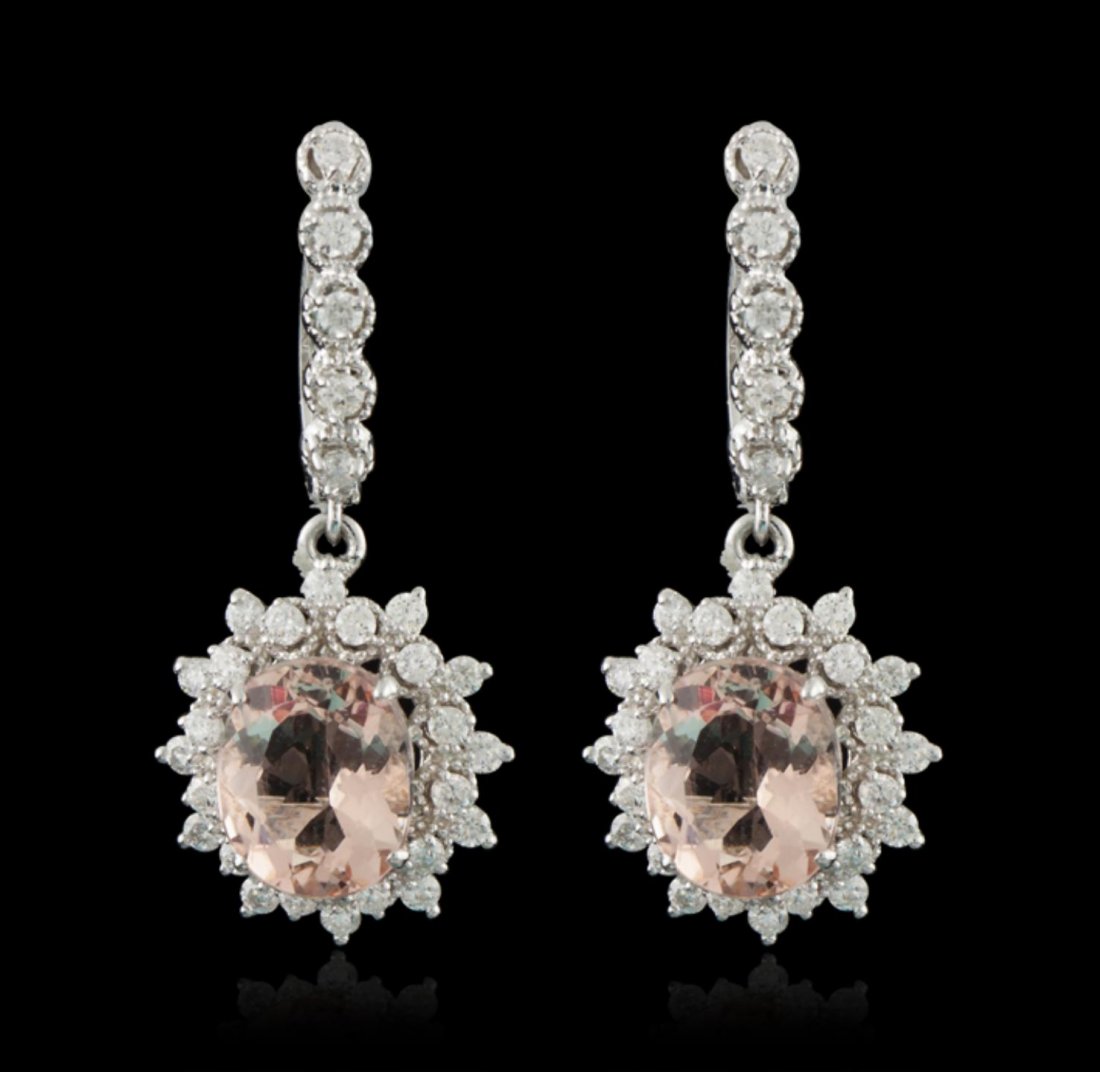 14KT White Gold 6.77ctw Morganite and Diamond Earrings: 14KT White Gold 6.77ctw Morganite and Diamond Earrings AJF5. Good Condition! WC5061BL. One pair electronically tested 14KT white gold ladies cast and assembled morganite and diamond dangle style earri