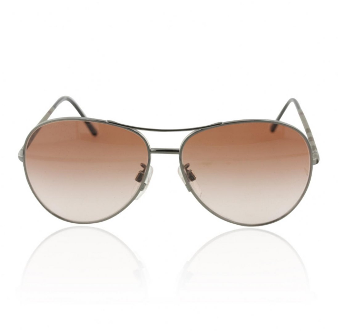 NWT Burberry Aviator Metal Sunglasses ED1751: NWT Burberry Aviator Metal Sunglasses ED1751. Good Condition. TH351MP. Metal Aviator sunglasses with box, case and tags. Gradient lens lend glamourous edge to metal aviators styled with burberry. Chec