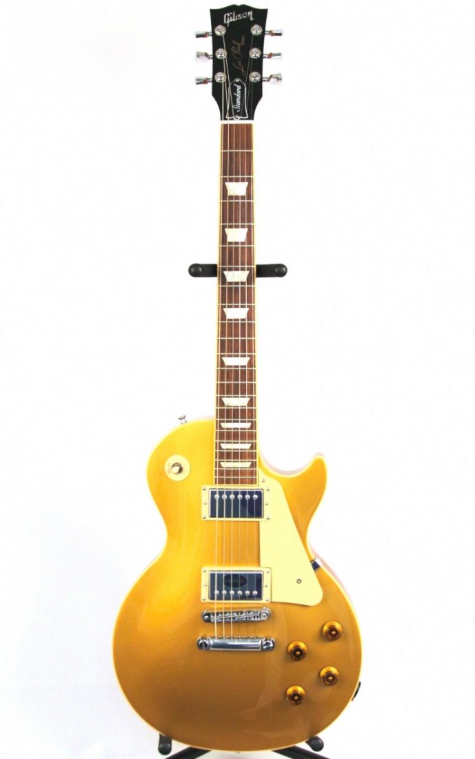 Gibson Les Paul Standard with Case DGUI120: Gibson Les Paul Standard with Case DGUI120. Excellent Condition! FW3091ZE. One used Gibson Les Paul Standard 2008 Model Gold Top 2009. Features an asymmetrical neck shape, locking tuners, locking brid
