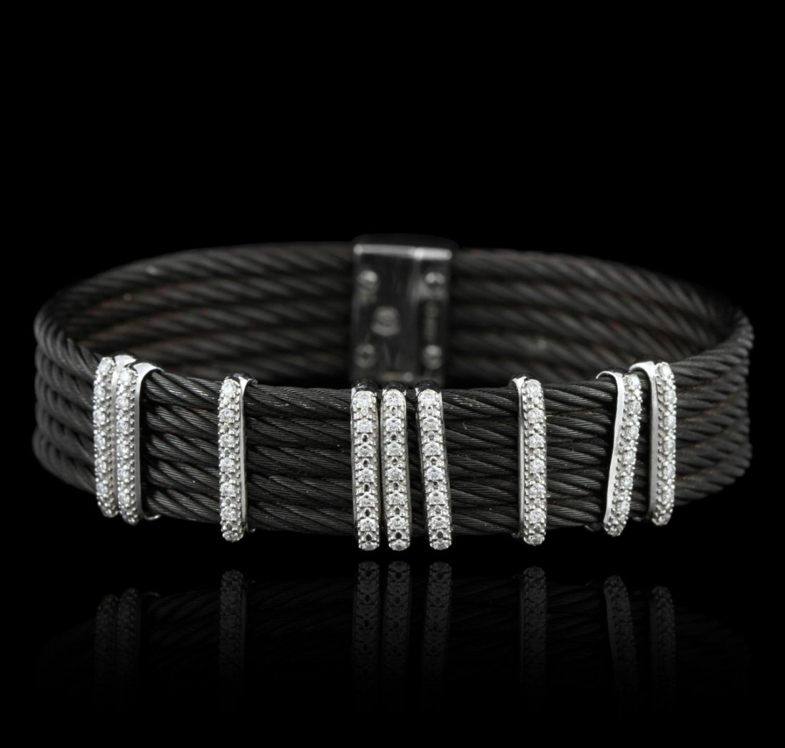 18KT White Gold Charriol Diamond Black S/S Rope: 18KT White Gold Charriol Diamond Black S/S Rope Bracelet GB2596. Good Condition. JV109KF. One charriol bangle bracelet featuring 18KT white gold, black and stainless steel rope, and diamonds.