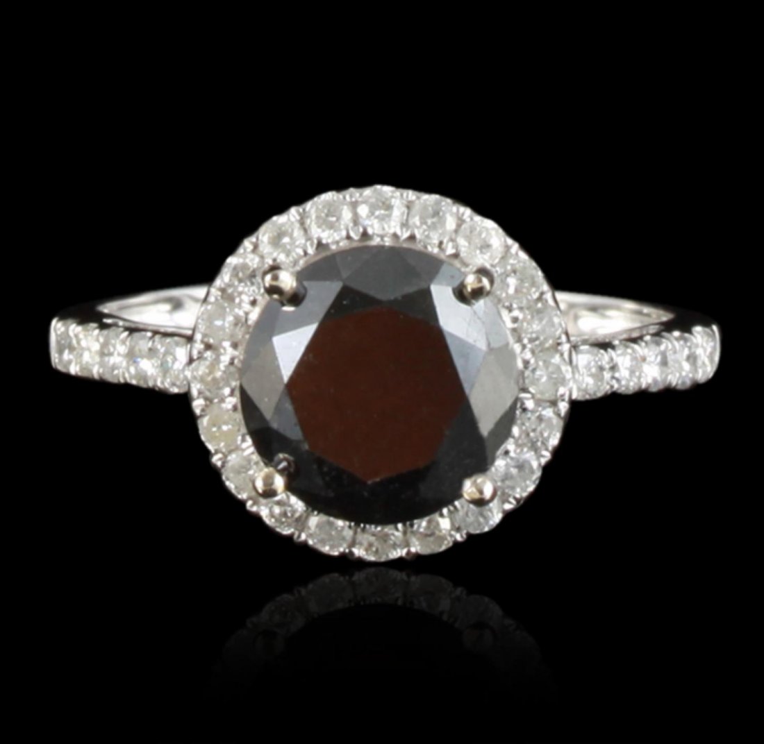 14KT White Gold 2.29ct Black Diamond Ring RM1213: 14KT White Gold 2.29ct Black Diamond Ring RM1213. New Condition! RP108CR. One electronically tested 14KT white gold ladies cast black and white diamond ring with a bright polish finish. Condition is n
