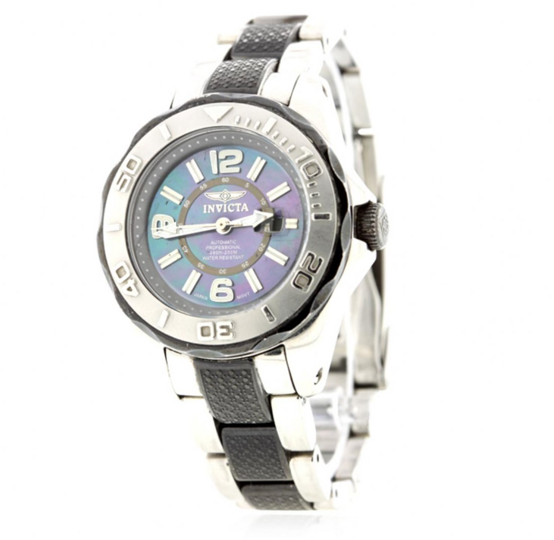 Ladies Invicta Knurled Pro Diver Automatic Wristwatch: Ladies Invicta Knurled Pro Diver Automatic Wristwatch GB1716. Good Condition! DP202GQ. One women's Pro Diver Two-Tone Watch from Invicta featuring: a unidirectional bezel with raised Arabic numeral in