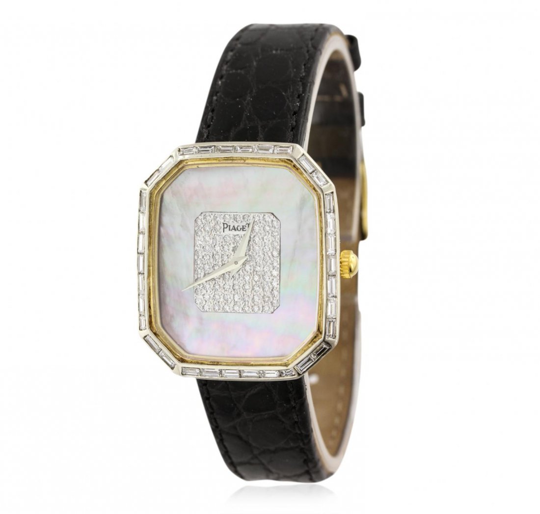 Mid Size Piaget Diamond Wristwatch GB3209: Mid Size Piaget Diamond Wristwatch GB3209. Average Condition! FJ7574RH. One, Piaget wristwatch, electronically tested 18KT yellow gold, Bright Finish Case: 33 x 30mm, Case Back: secured by four set sc