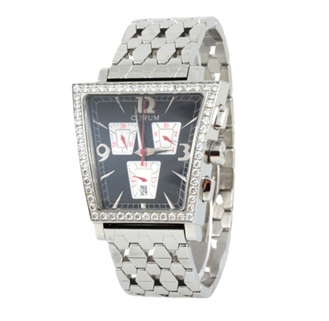 Ladies Corum Trapeze Wristwatch GB1996: Ladies Corum Trapeze Wristwatch GB1996. Great Condition! CB1003GV. One ladies Corum Trapeze wristwatch featuring: stainless steel case and band, black dial with 3 silver subdials, date calendar at 6 o