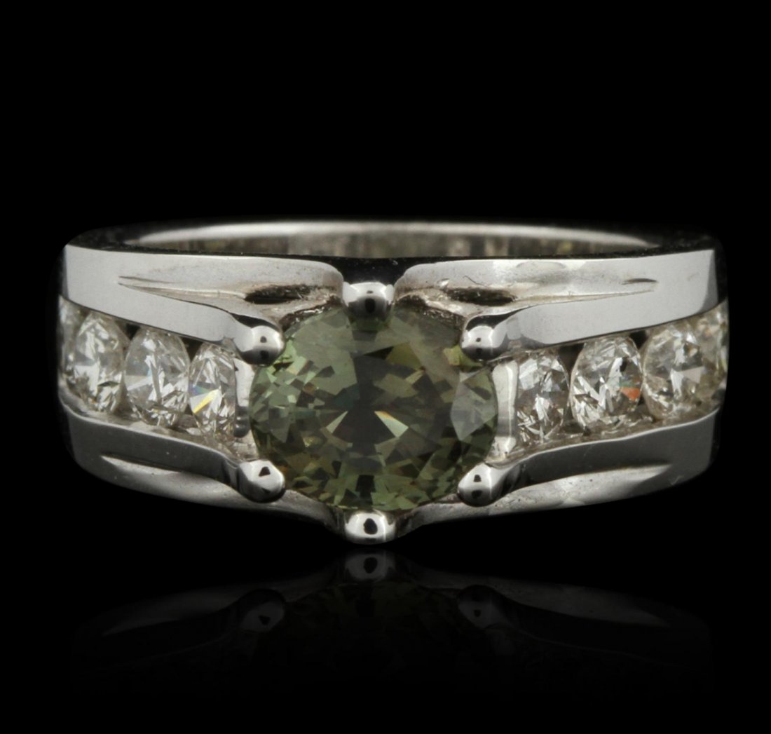 14KT White Gold 1.76ct Alexandrite and Diamond Ring: 14KT White Gold 1.76ct Alexandrite and Diamond Ring GB2172. Good Condition! LL1054TZ. One ring featuring: 8.7 grams of 14KT white gold, (1) alexandrite with a total weight of 1.76ct and diamonds with