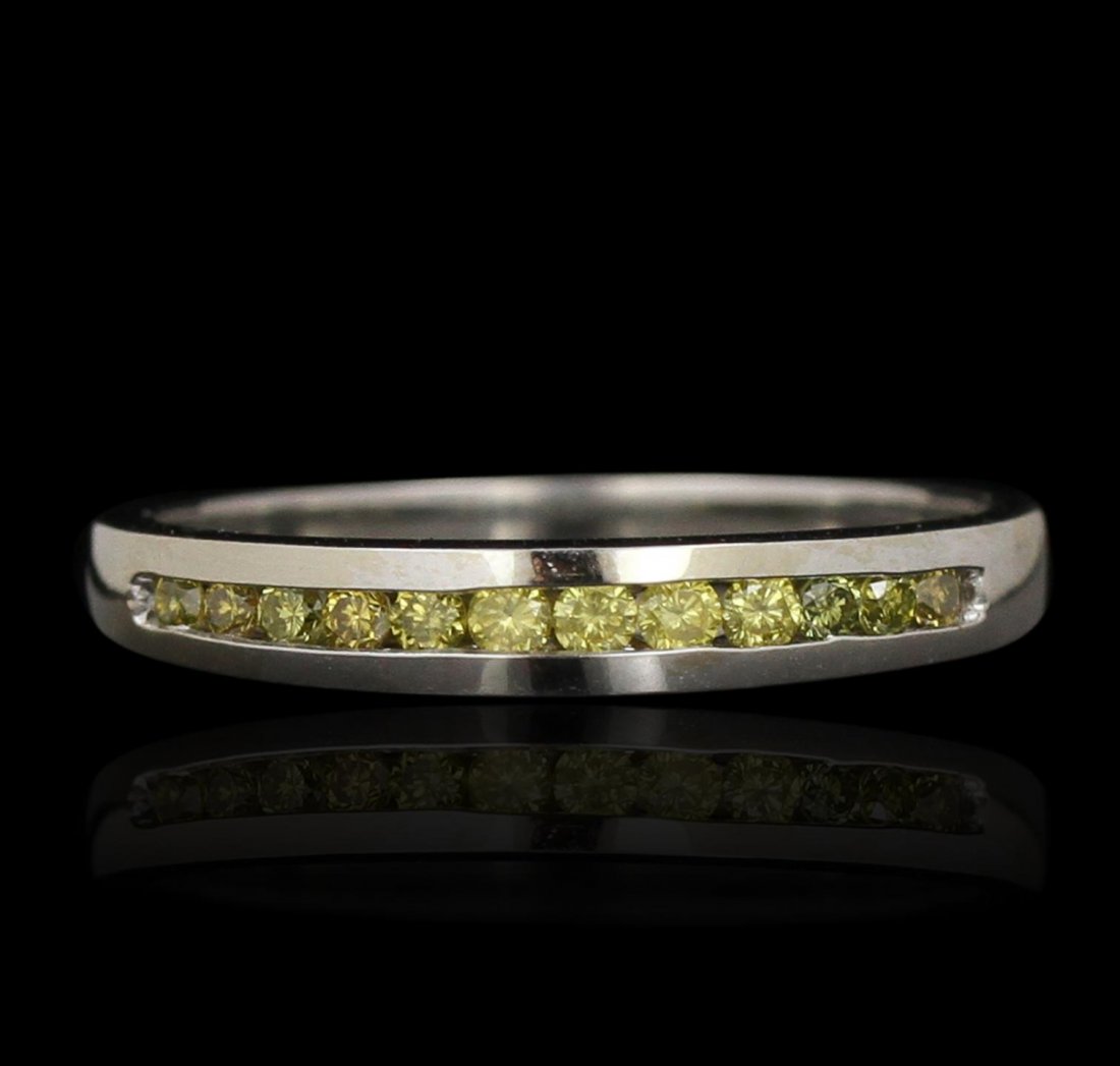 14KT White Gold 0.14ctw Yellow Diamond Ring GB4485: 14KT White Gold 0.14ctw Yellow Diamond Ring GB4485. Good Condition! AU603JG. One ring featuring: 1.70 grams of 14KT white gold and 0.14ctw of yellow diamonds.