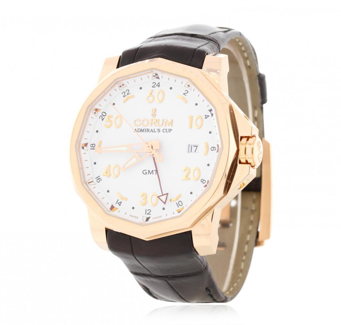 Gents Corum 18KT Rose Gold Admiral's Cup GMT Wristwatch: Gents Corum 18KT Rose Gold Admiral's Cup GMT Wristwatch GB3202. Fine Condition! ZB4009JV. One gents, Corum 18KT Rose gold Admiral's Cup GMT wristwatch electronically tested, Case: 44mm, Case Back: Exh