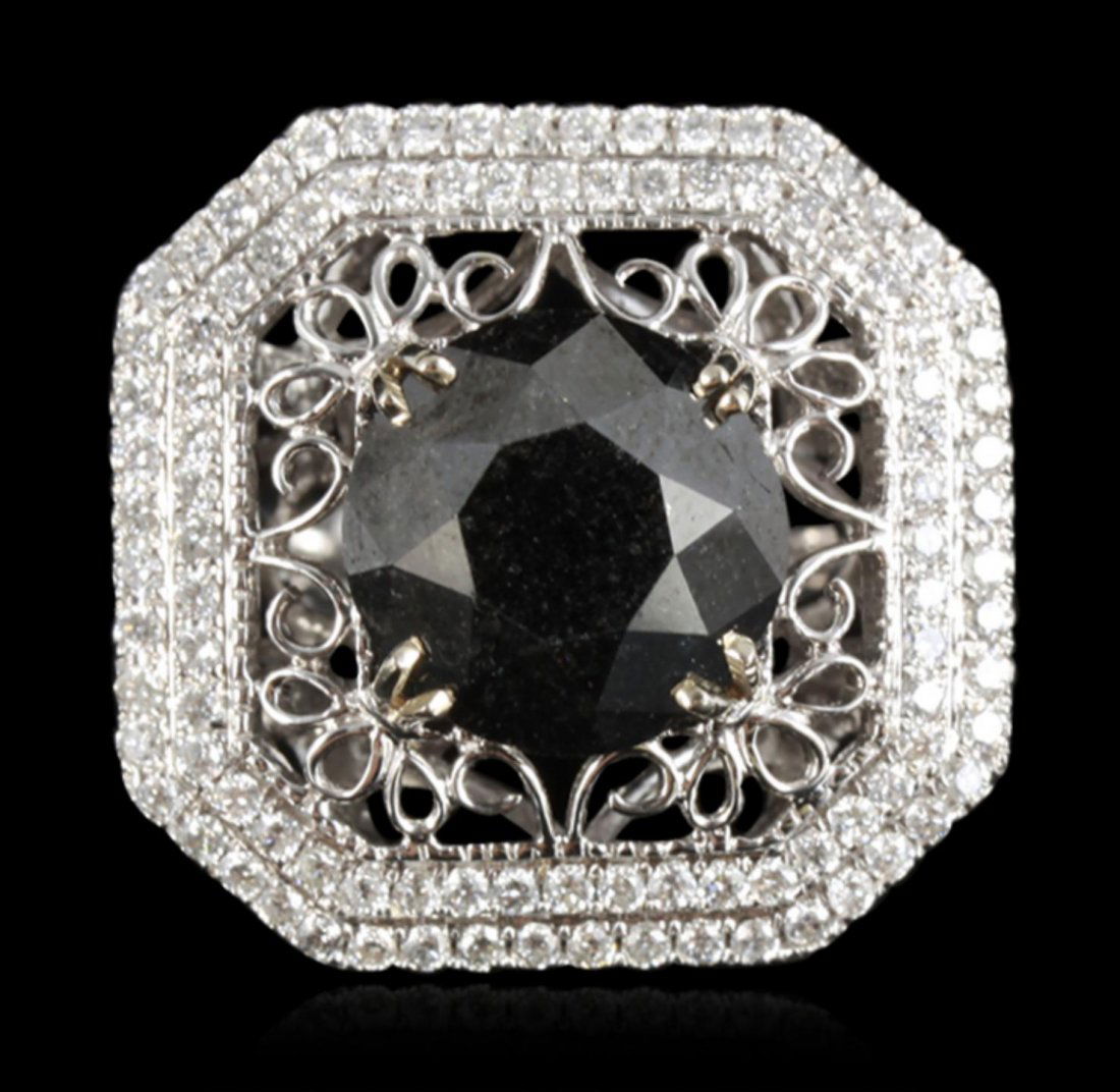 14KT White Gold 9.23ct Black Diamond Ring RM1132: 14KT White Gold 9.23ct Black Diamond Ring RM1132. Great Condition! EG1522SZ. One electronically tested 14KT white gold ladies cast black and white diamond ring. Condition is new, good workmanship. The