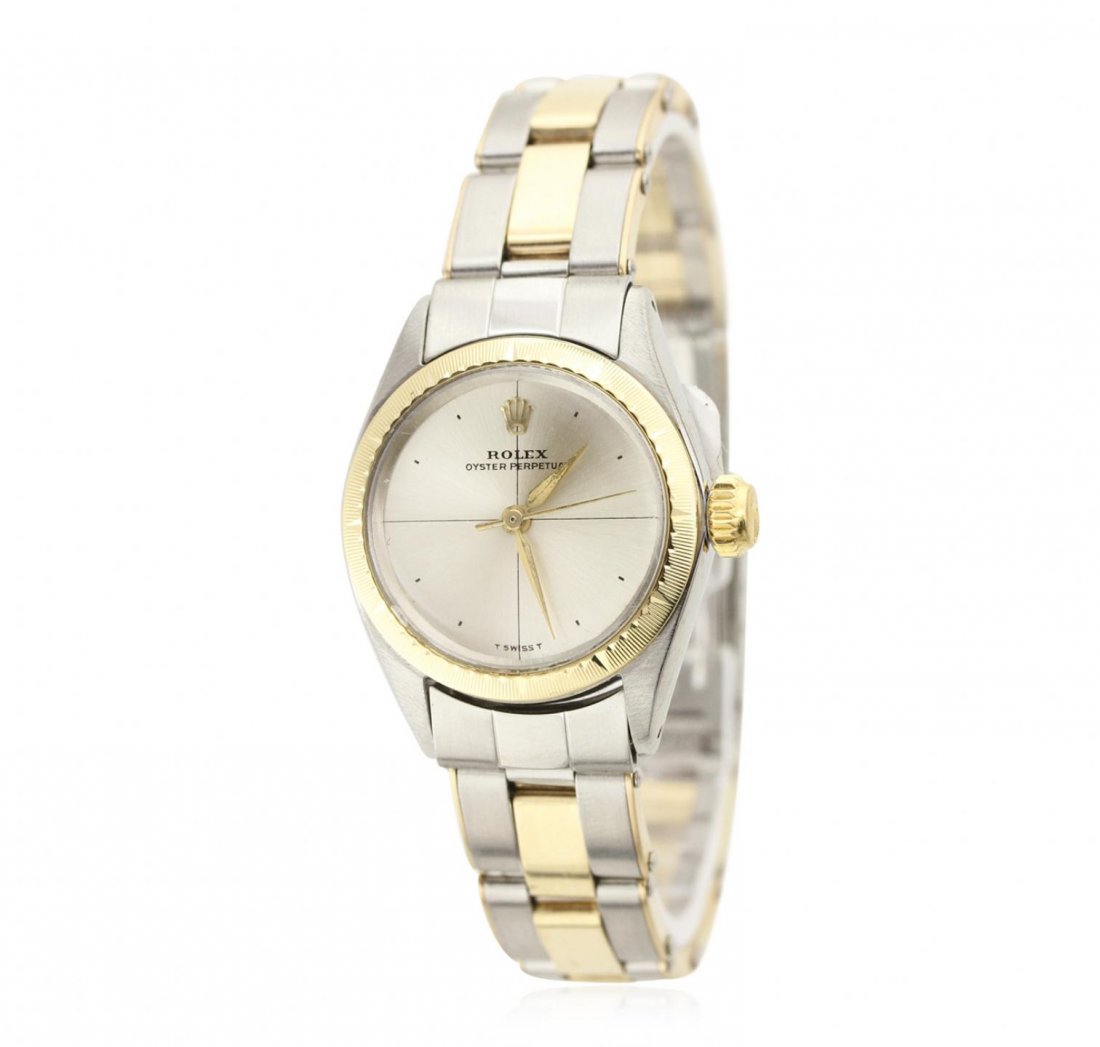 Ladies Rolex Two Tone Oyster Perpetual Wristwatch A7325: Ladies Rolex Two Tone Oyster Perpetual Wristwatch A7325. Excellent Condition! SR5522AT. One hand crafted & machine milled Rolex Lady's Oyster Perpetual wristwatch stainless steel and 14KT yellow gold 