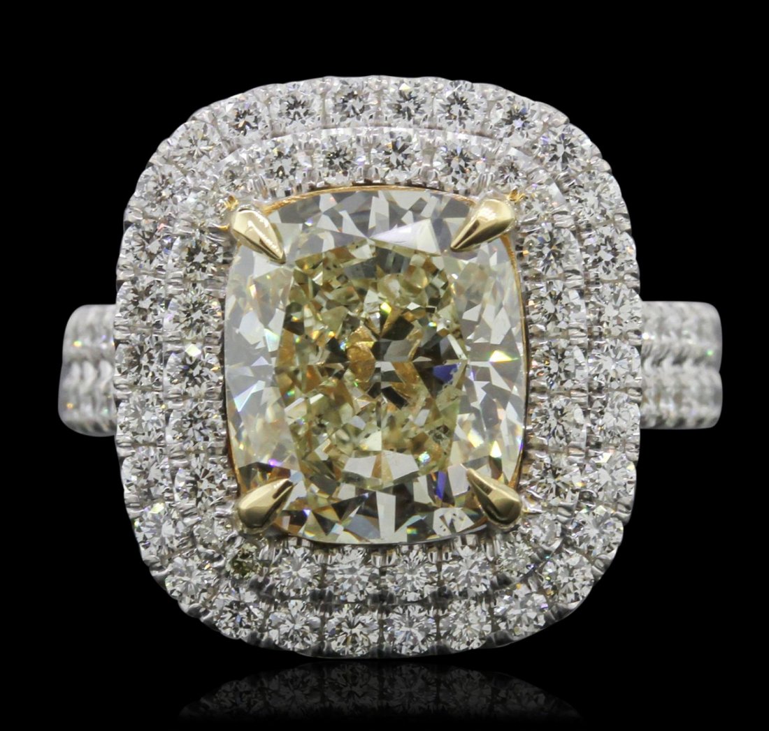 18KT White Gold 4.53ct SI1/Light Yellow Diamond Ring: 18KT White Gold 4.53ct SI1/Light Yellow Diamond Ring A7858. Great Condition! AH81092KW. One electronically tested 18KT white gold ladies cast & assembled diamond unity ring with a bright polish finish