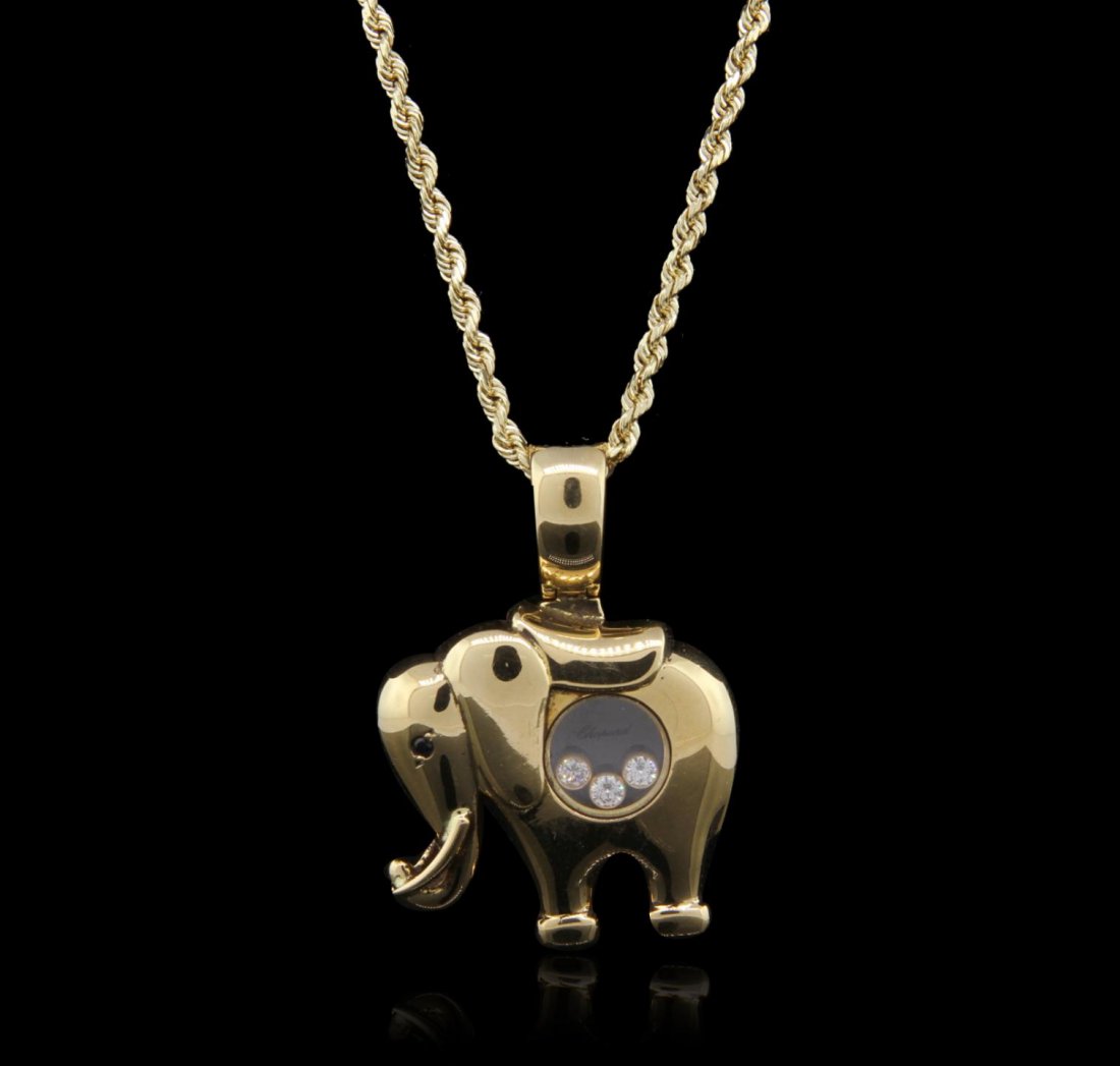 Chopard 18KT Yellow Gold 0.36ctw Diamond Pendant with: Chopard 18KT Yellow Gold 0.36ctw Diamond Pendant with Chain GB5086. Good Condition! SA4053KC. One chopard ring featuring: 26.1 grams of 18KT Yellow Gold and 0.36cts of Diamonds.